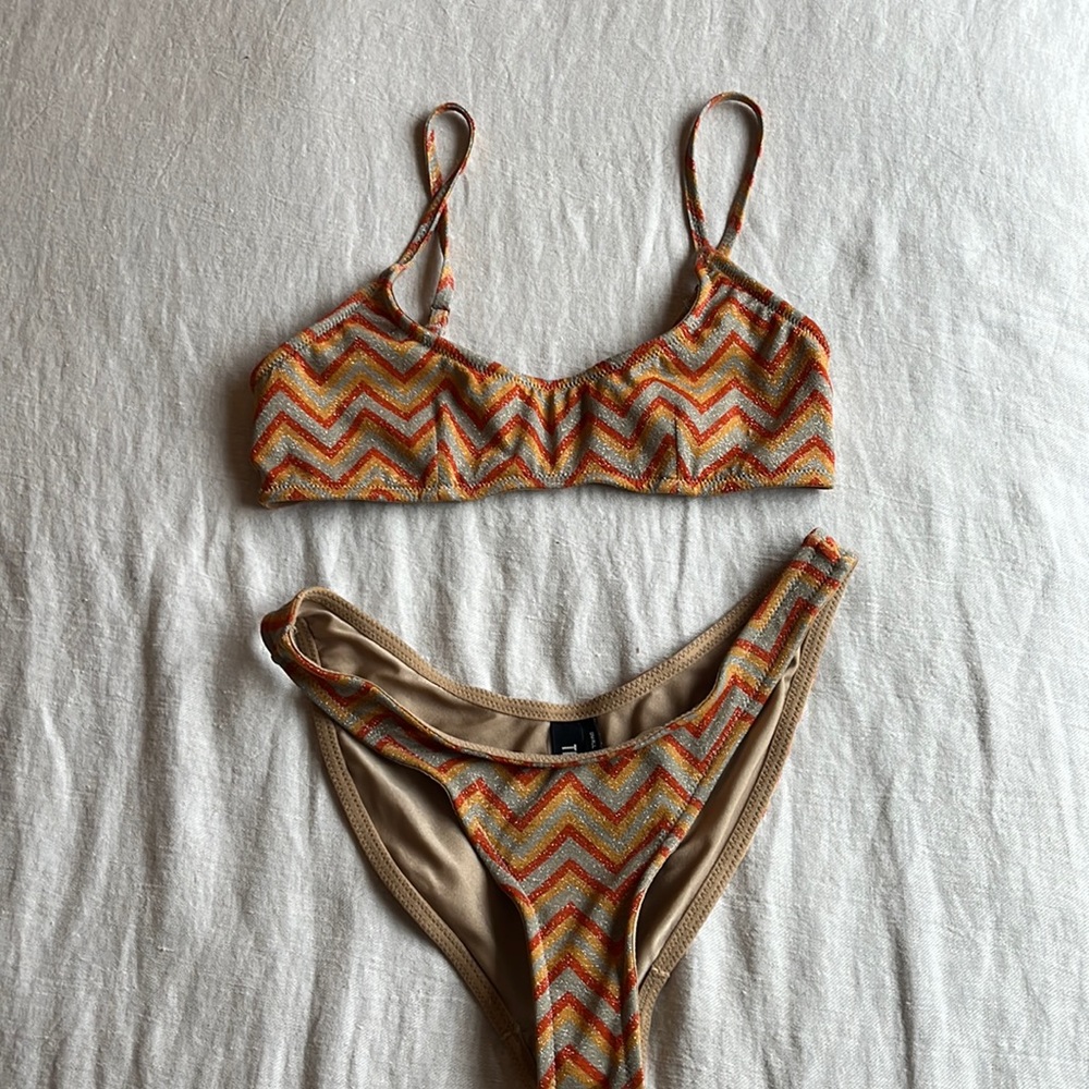 TRIANGL Maci Saliere top and bottom set in small. Comes with bag!